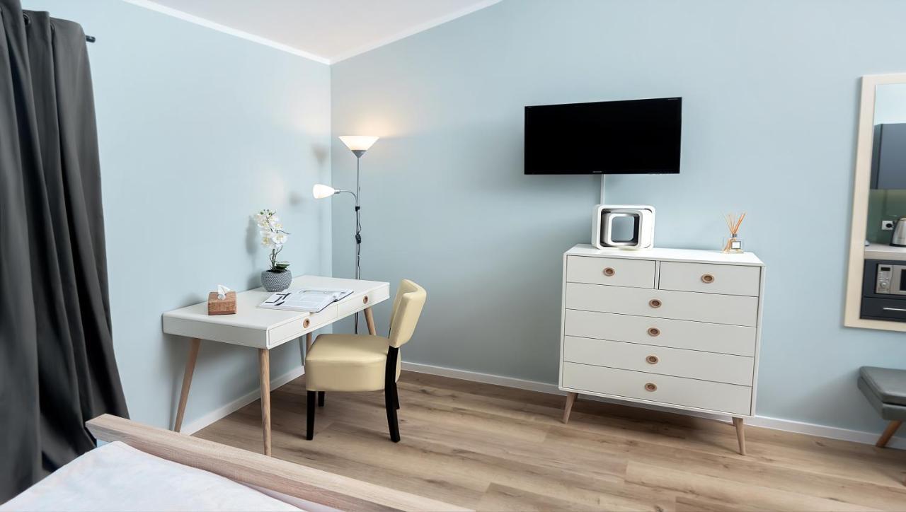 Triple A³ Aparthotel มาร์คทายเดินเฟลด์ ภายนอก รูปภาพ